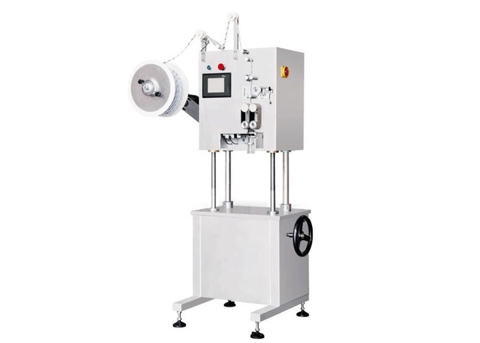 AUTOMATIC DESICCANT INSERTER